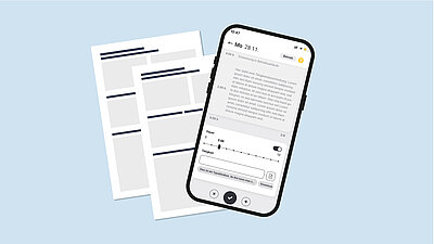 Digitales Berichtsheft auf Smartphone liegt über Berichtsheften auf Papier